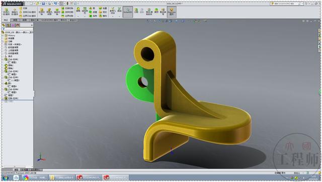 用SolidWorks画的金属连接件，此图蓝色面的切除，是个小难点